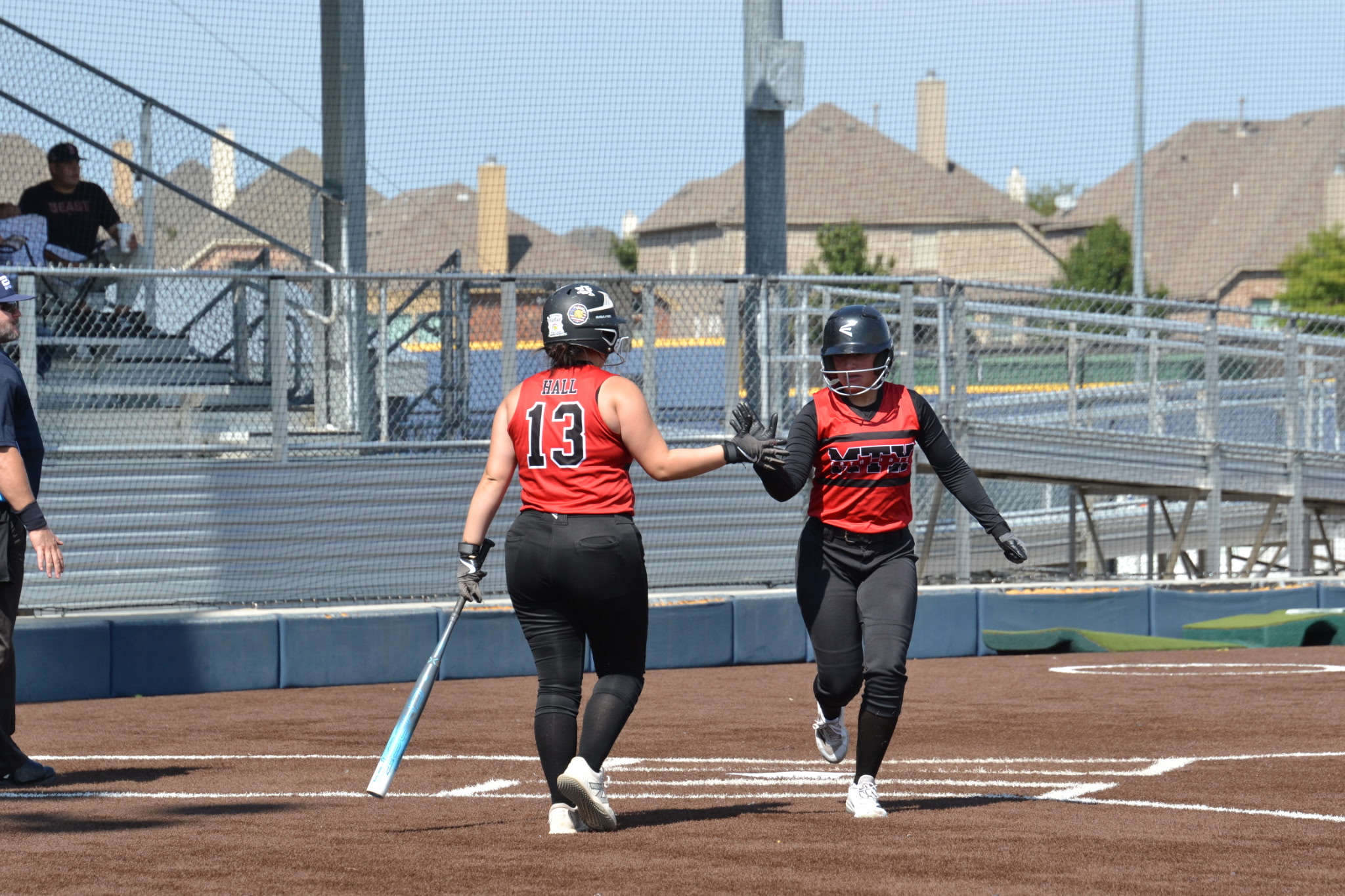 Shannon playing softball